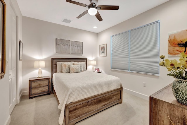 bedroom featuring recessed lighting, visible vents, light carpet, ceiling fan, and baseboards