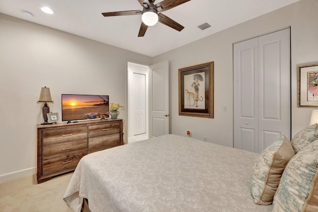 bedroom featuring visible vents, ceiling fan, light carpet, and baseboards