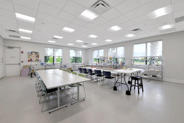 dining space featuring visible vents and a healthy amount of sunlight