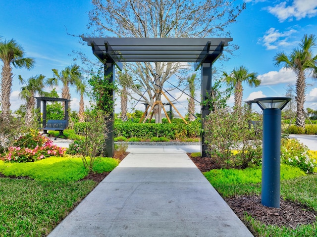 surrounding community featuring a pergola