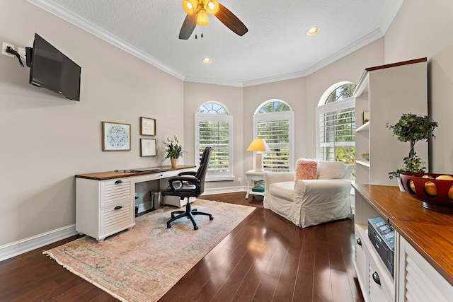 office with ceiling fan, dark wood-type flooring, ornamental molding, and a textured ceiling