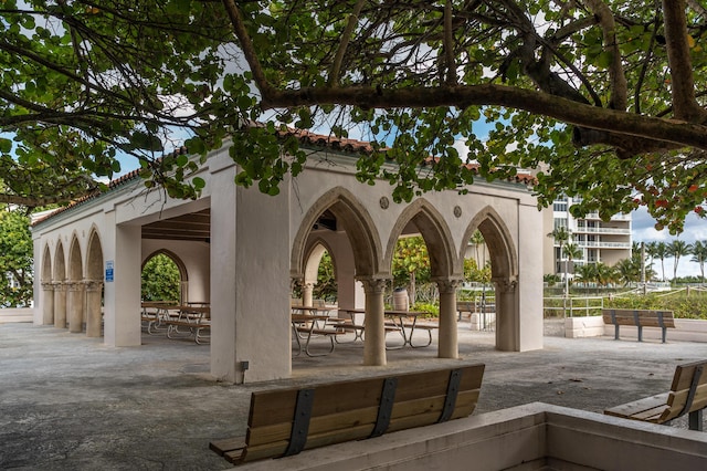 view of property's community with a patio area