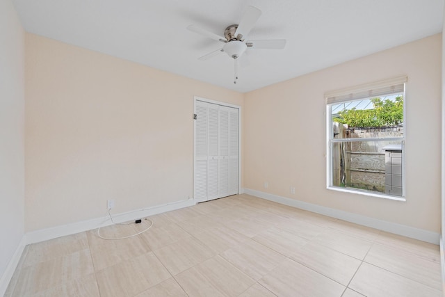 empty room featuring ceiling fan