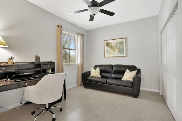 tiled office space with ceiling fan