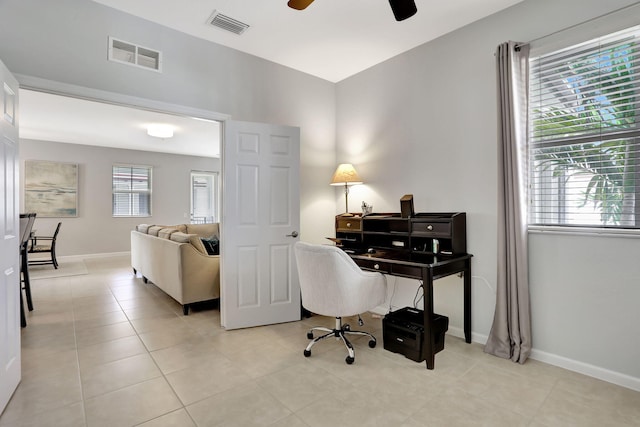 office area featuring ceiling fan and light tile patterned floors