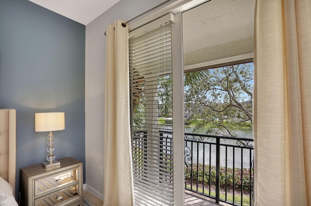 interior space with a water view and a wealth of natural light