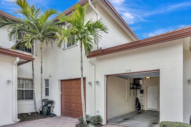 exterior space with a garage