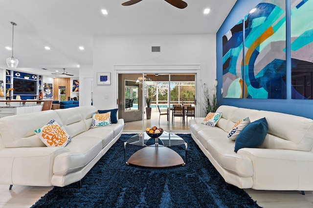 living room featuring ceiling fan