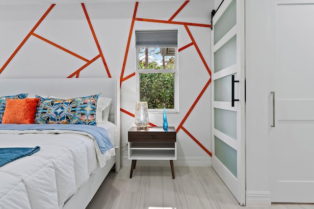 bedroom with a barn door