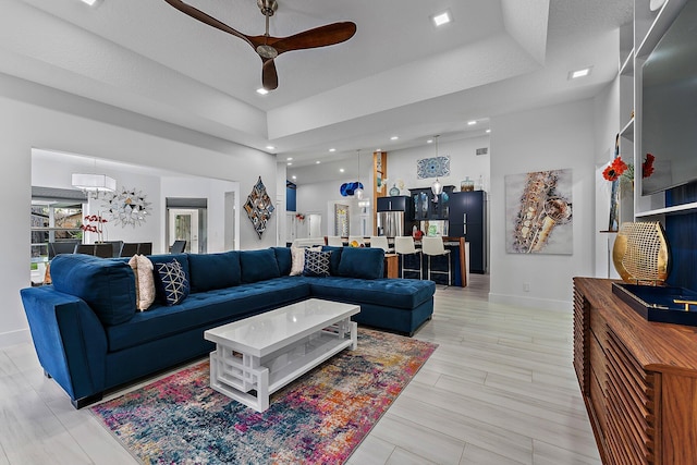 living room with ceiling fan