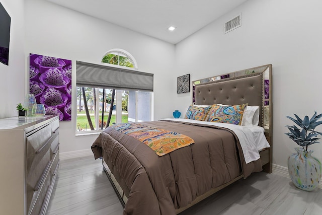 bedroom featuring light wood-type flooring