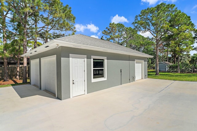 view of outbuilding with a garage