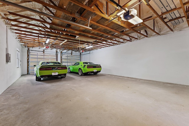 garage featuring a garage door opener