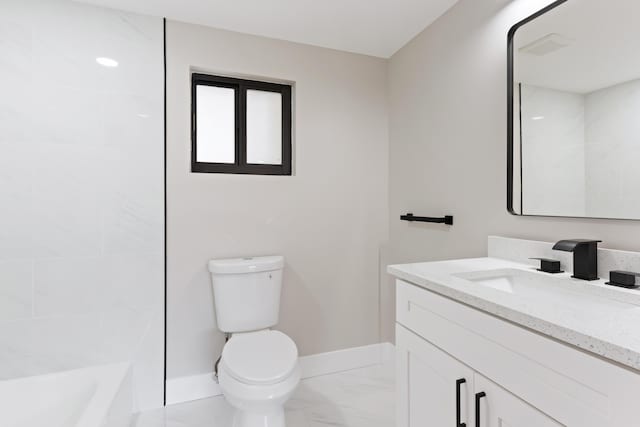 full bathroom featuring vanity, tiled shower / bath combo, and toilet