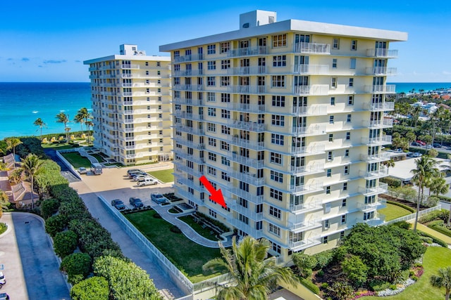 view of building exterior featuring a water view