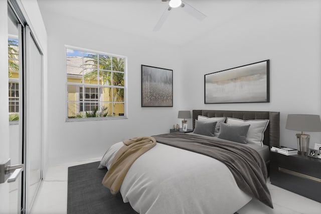 bedroom featuring a closet and ceiling fan