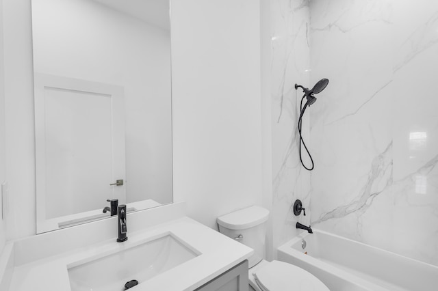 full bathroom featuring vanity, toilet, and tiled shower / bath combo