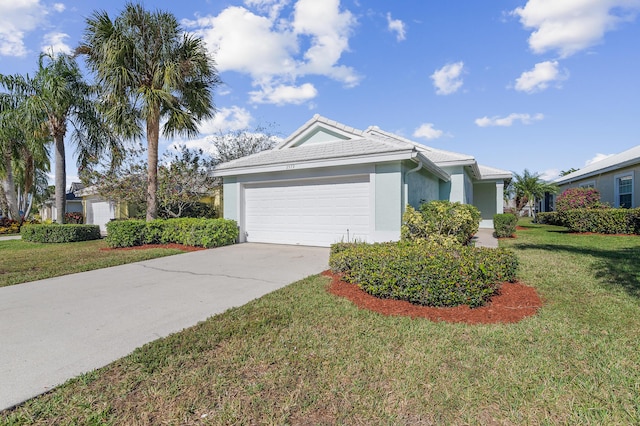 ranch-style home with a garage and a front yard