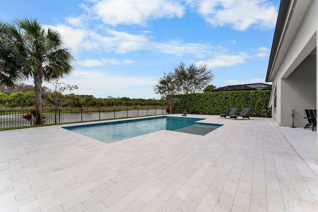 view of pool with a patio area, a fenced backyard, and a fenced in pool