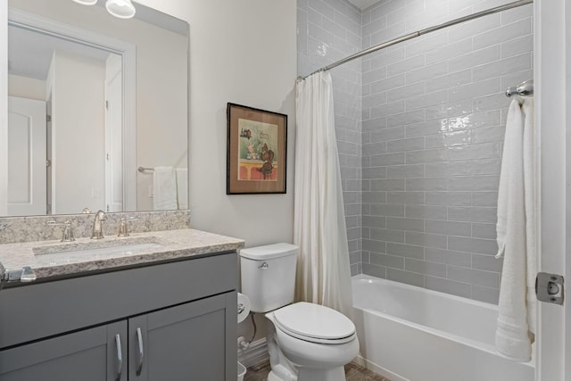 bathroom with shower / bath combo with shower curtain, toilet, wood finished floors, baseboards, and vanity