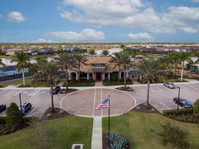 birds eye view of property with a residential view