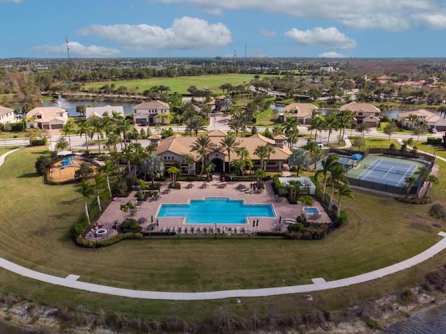 aerial view featuring a residential view and a water view