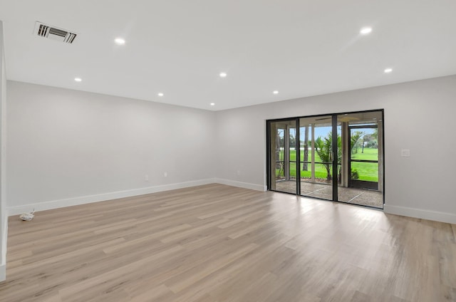 empty room with light wood-type flooring