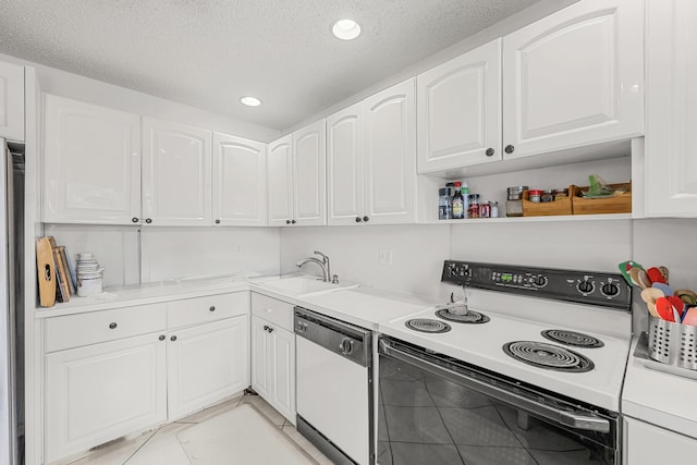 kitchen featuring sink, white cabinetry, electric range oven, a textured ceiling, and white dishwasher