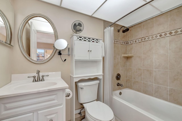 bathroom featuring shower / bath combo, vanity, and toilet