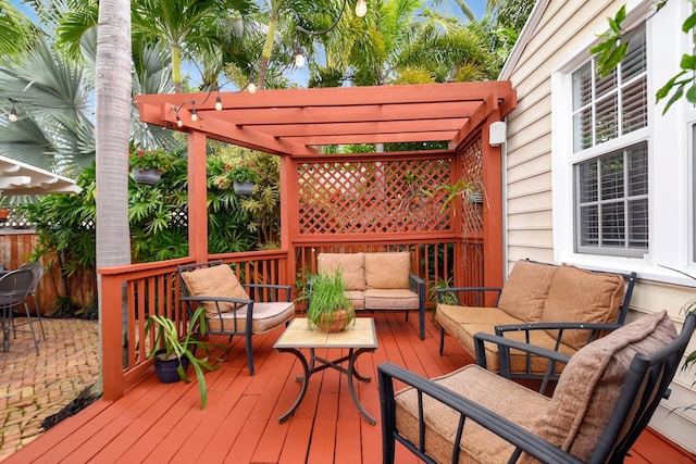 deck featuring an outdoor hangout area and a pergola