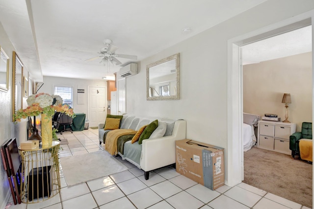 living room with light carpet, light tile patterned flooring, a ceiling fan, and a wall mounted air conditioner