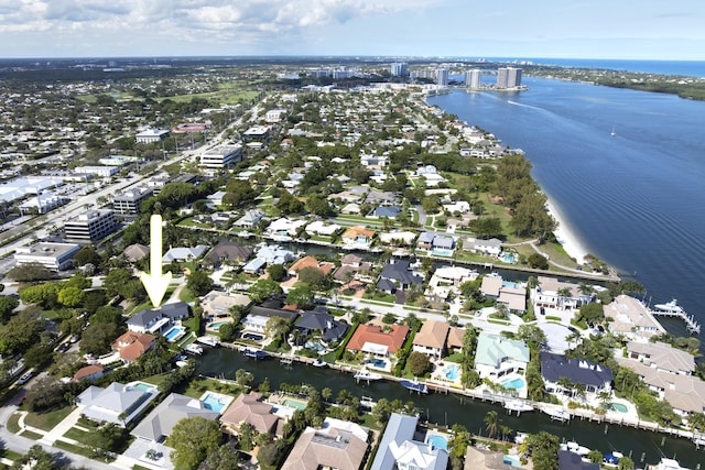 birds eye view of property featuring a residential view and a water view