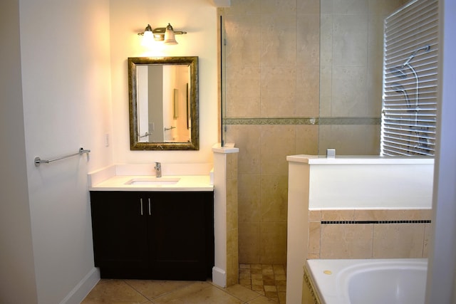 2749 SW Backton Ave, Port Saint Lucie, FL 34987 - full bath featuring a bath, tile patterned flooring, vanity, a walk in shower, and baseboards