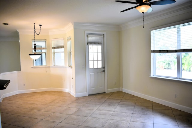 2749 SW Backton Ave, Port Saint Lucie, FL 34987 - unfurnished room featuring light tile patterned flooring, ornamental molding, ceiling fan, and baseboards