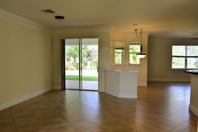 2749 SW Backton Ave, Port Saint Lucie, FL 34987 - tiled empty room with ornamental molding and baseboards