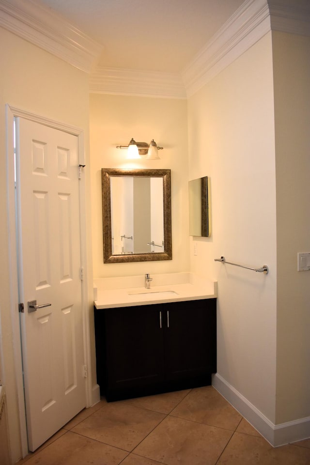 2749 SW Backton Ave, Port Saint Lucie, FL 34987 - bathroom featuring vanity, ornamental molding, baseboards, and tile patterned flooring