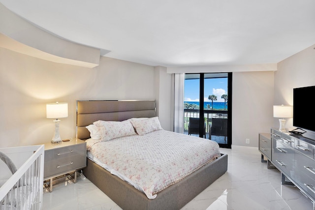 4545 N Ocean Blvd Unit 3A, Boca Raton, FL 33431 - bedroom with light marble finish floors, access to exterior, and baseboards