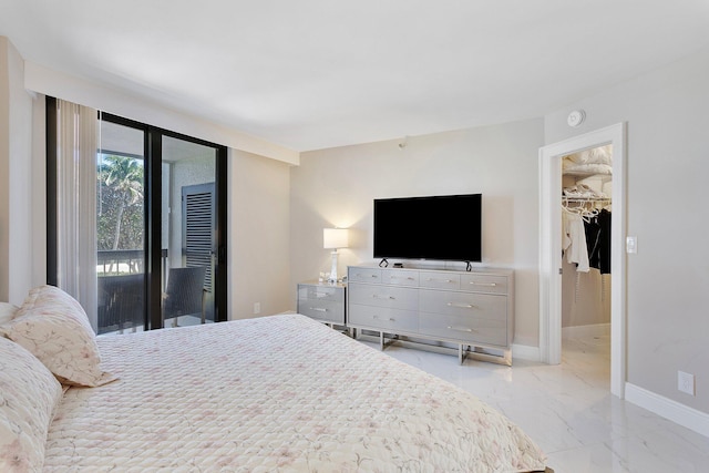 4545 N Ocean Blvd Unit 3A, Boca Raton, FL 33431 - bedroom with light marble finish flooring, baseboards, a walk in closet, and a closet