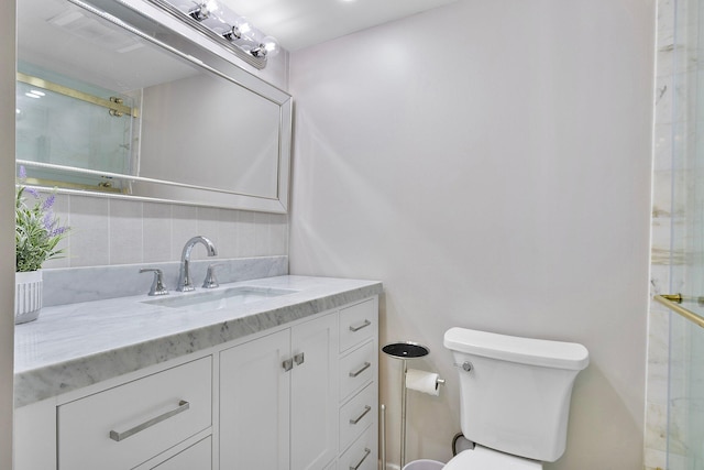4545 N Ocean Blvd Unit 3A, Boca Raton, FL 33431 - full bath with tasteful backsplash, a shower with door, toilet, and vanity