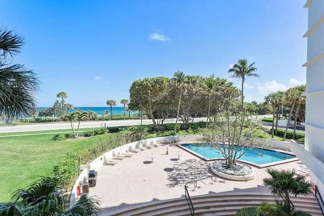 4545 N Ocean Blvd Unit 3A, Boca Raton, FL 33431 - community pool featuring a lawn, a water view, and a patio