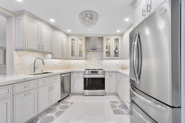 4545 N Ocean Blvd Unit 3A, Boca Raton, FL 33431 - kitchen featuring appliances with stainless steel finishes, wall chimney range hood, a sink, recessed lighting, and light marble finish flooring