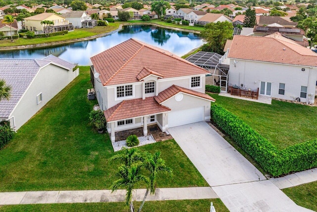 aerial view with a residential view and a water view