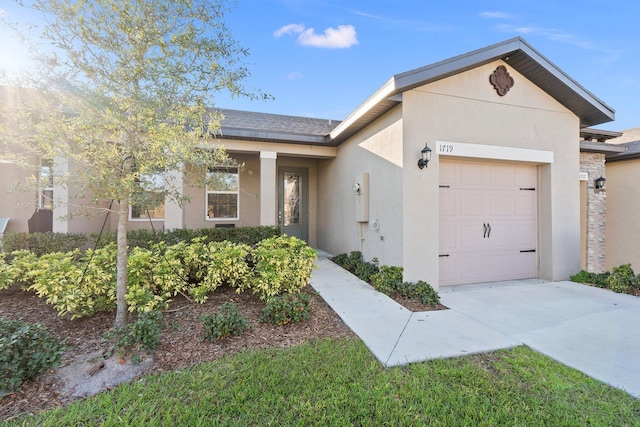 single story home with a garage