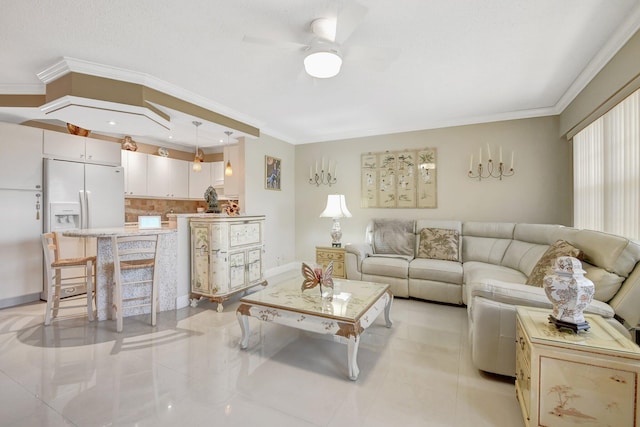 living room with ceiling fan, ornamental molding, and light tile patterned floors