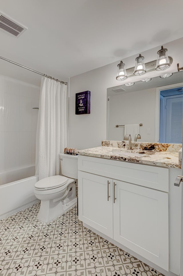 full bath with shower / tub combo, visible vents, vanity, and toilet