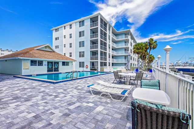 pool with a patio area