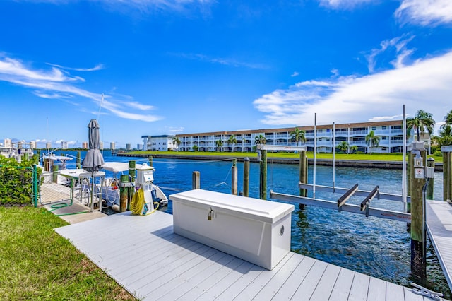 dock area featuring a water view and boat lift