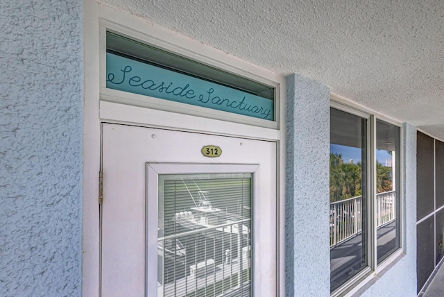 exterior details featuring stucco siding