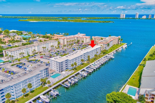 aerial view featuring a water view and a city view