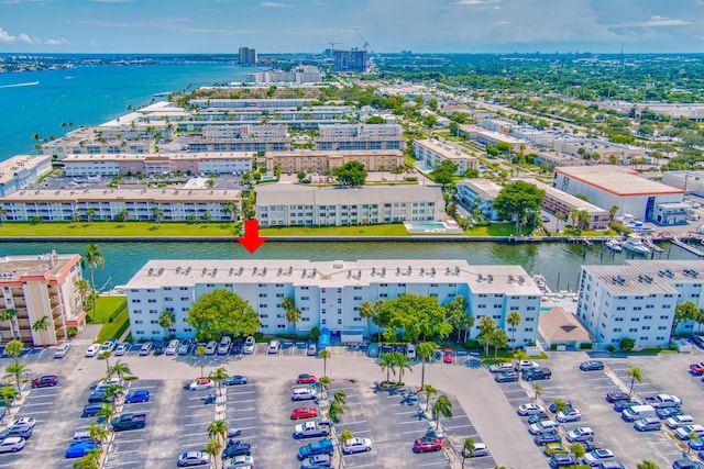 drone / aerial view with a water view and a city view